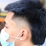 Elevating Style With A Mid Taper Fade with Design