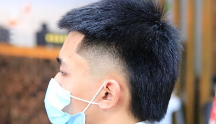 Elevating Style With A Mid Taper Fade with Design